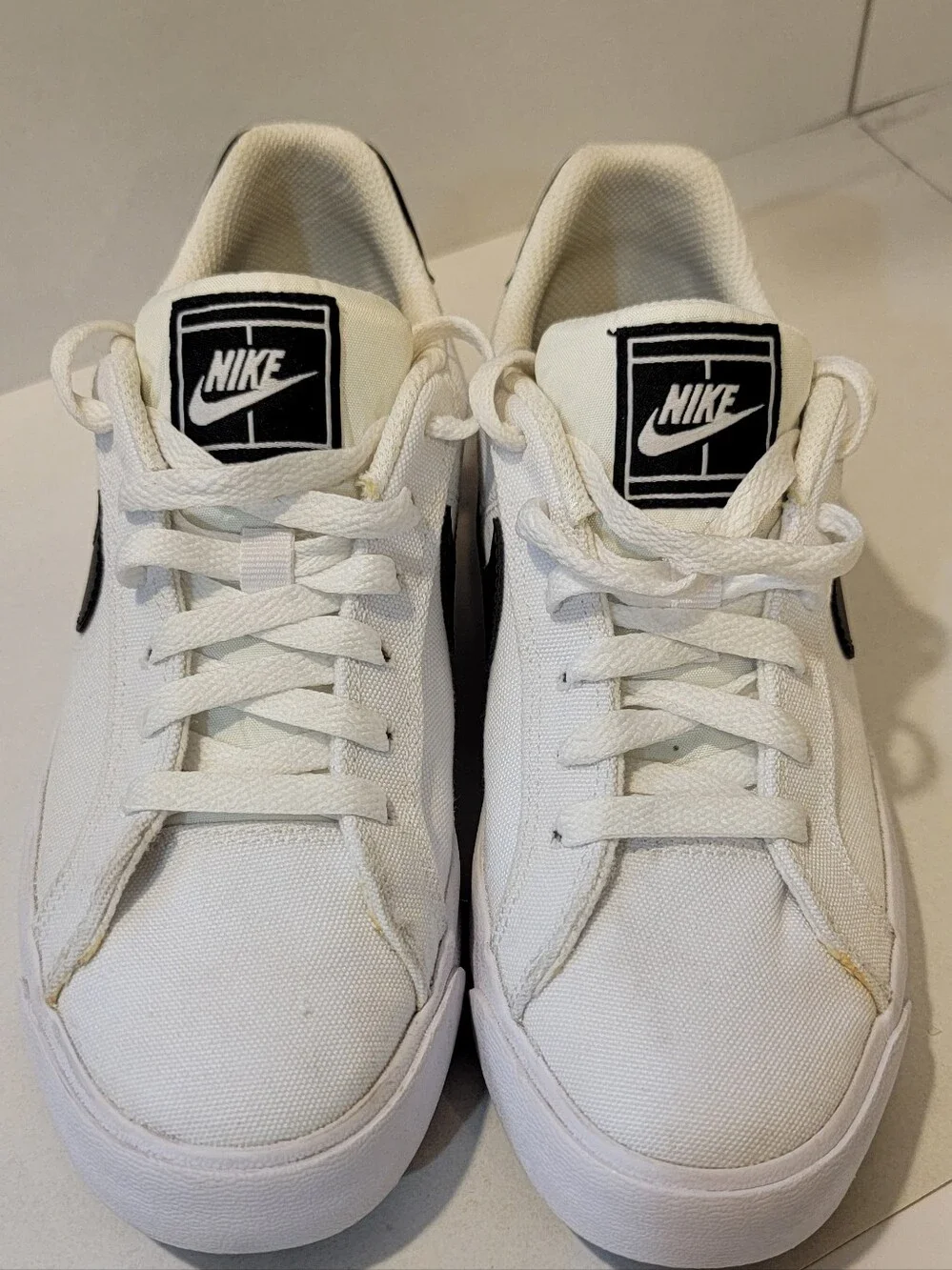 Nike White and Black Court Royale AC Sneakers with Black Swoosh